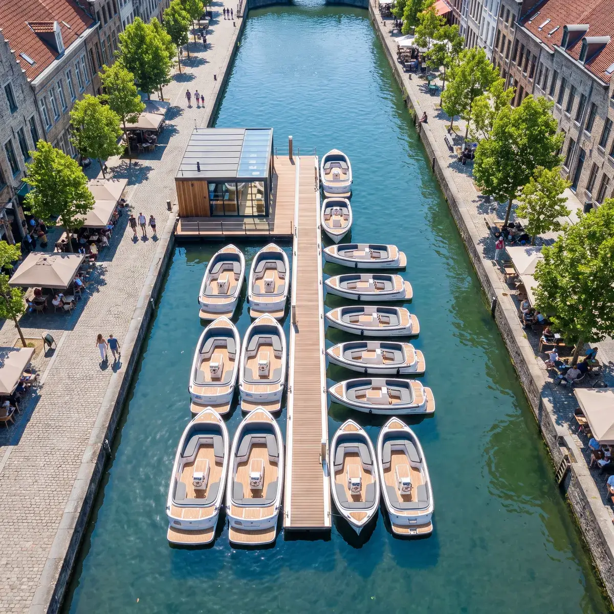 A rental pontoon with modern electric boats in a city canal, seen from above