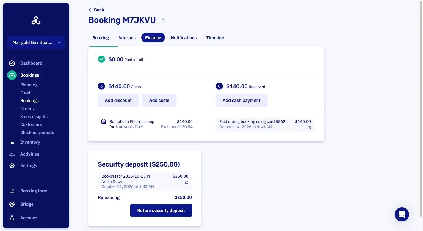 The finance tab of a booking in Let's Book: paid in full, the costs and what was received, and the deposit with what remains